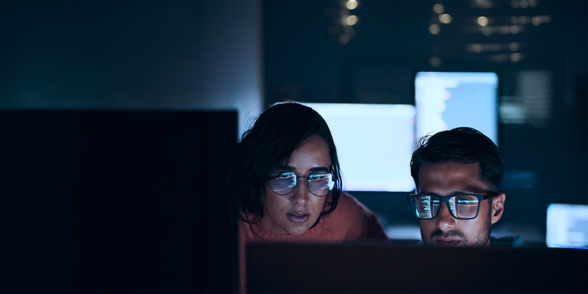Oneadvanced people looking at a computer screen for cyber security