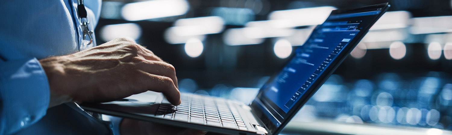 person using laptop for compromise assessment